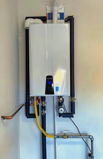 https://girrawheenhotwater.com.au/uploads/2025/06/instant-hot-water-systems-63860.jpg